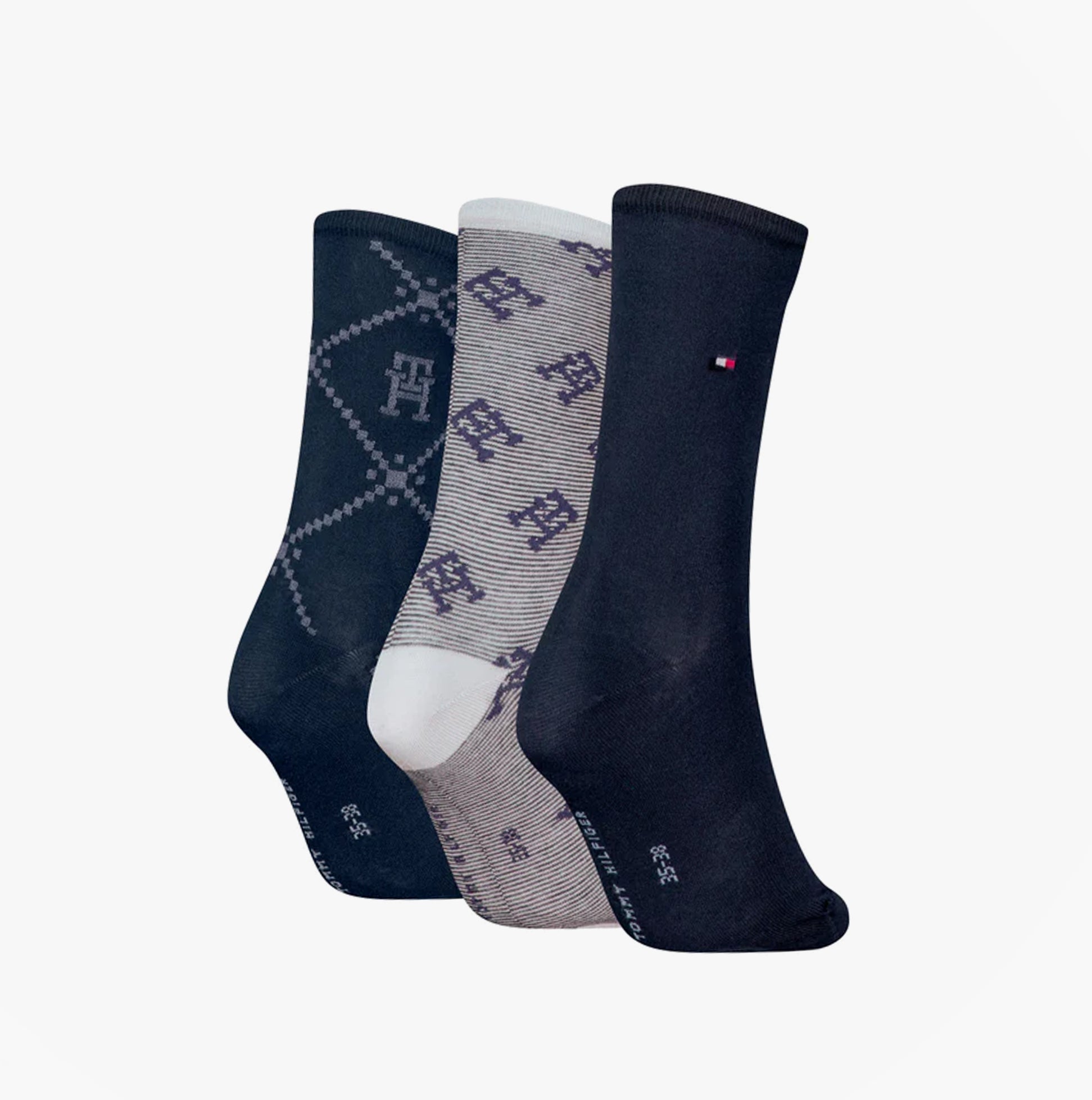 Tommy Hilfiger 3 Pack Giftboxed Monogram Womens Crew Socks Navy detailed view showing three different sock designs.