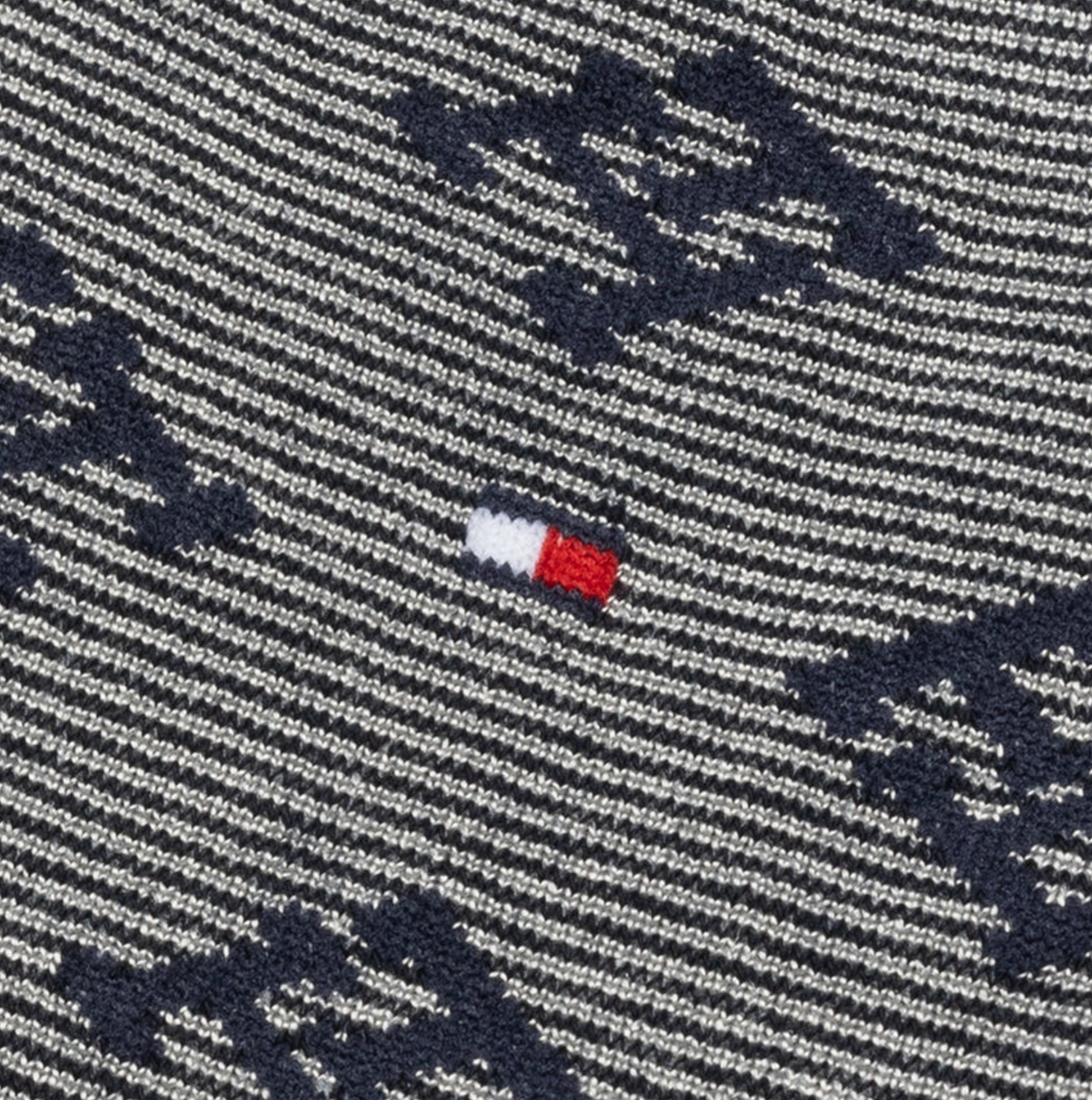Detail view of Tommy Hilfiger 3 Pack Giftboxed Monogram Womens Crew Socks Navy showing monogram pattern.