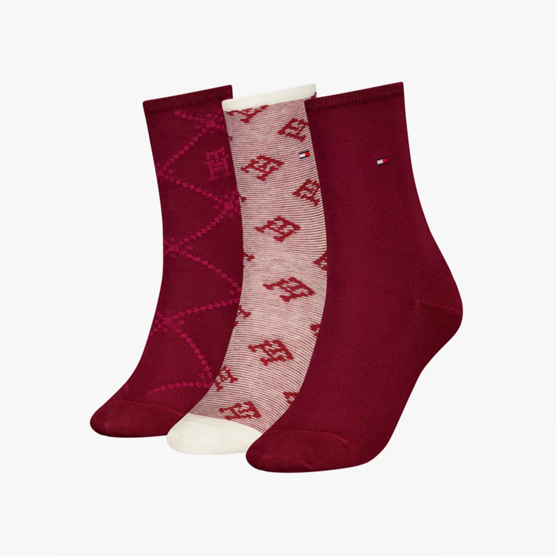 Tommy Hilfiger 3 Pack Giftboxed Monogram Womens Crew Socks Red, featuring red patterned and solid crew socks in gift box view.