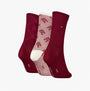 Tommy Hilfiger 3 Pack Giftboxed Monogram Womens Crew Socks Red front view showcasing three pairs in different red patterns.