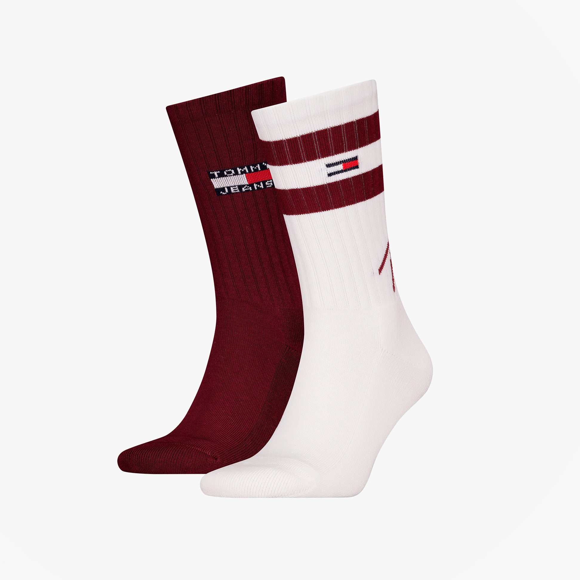 Tommy Hilfiger 2 Pack Trainer Signature Mens Crew Socks Red, side view showing two pairs: one red, one white with logo.