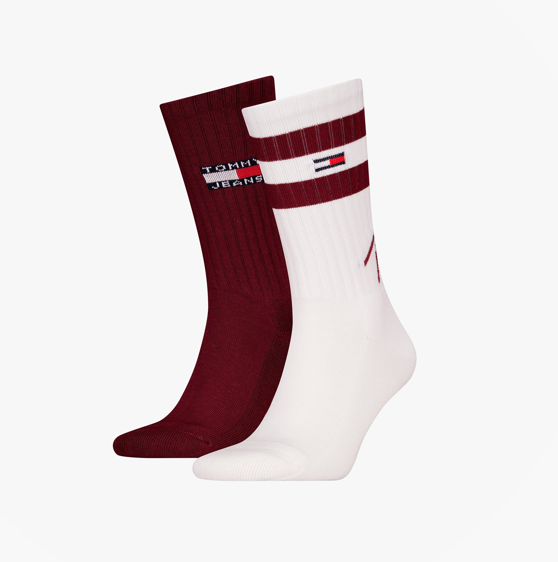 Tommy Hilfiger 2 Pack Trainer Signature Mens Crew Socks Red, side view showing two pairs: one red, one white with logo.