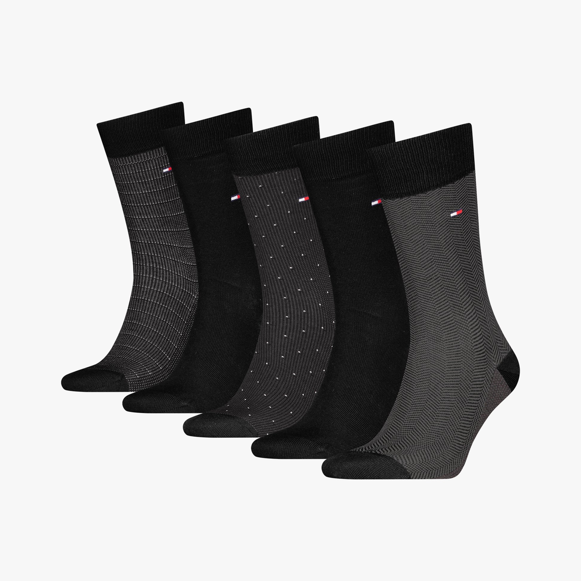 Tommy Hilfiger 5 Pack Giftbox Herringbone Mens Socks Black side view displaying various patterns and textures in crew sock style.