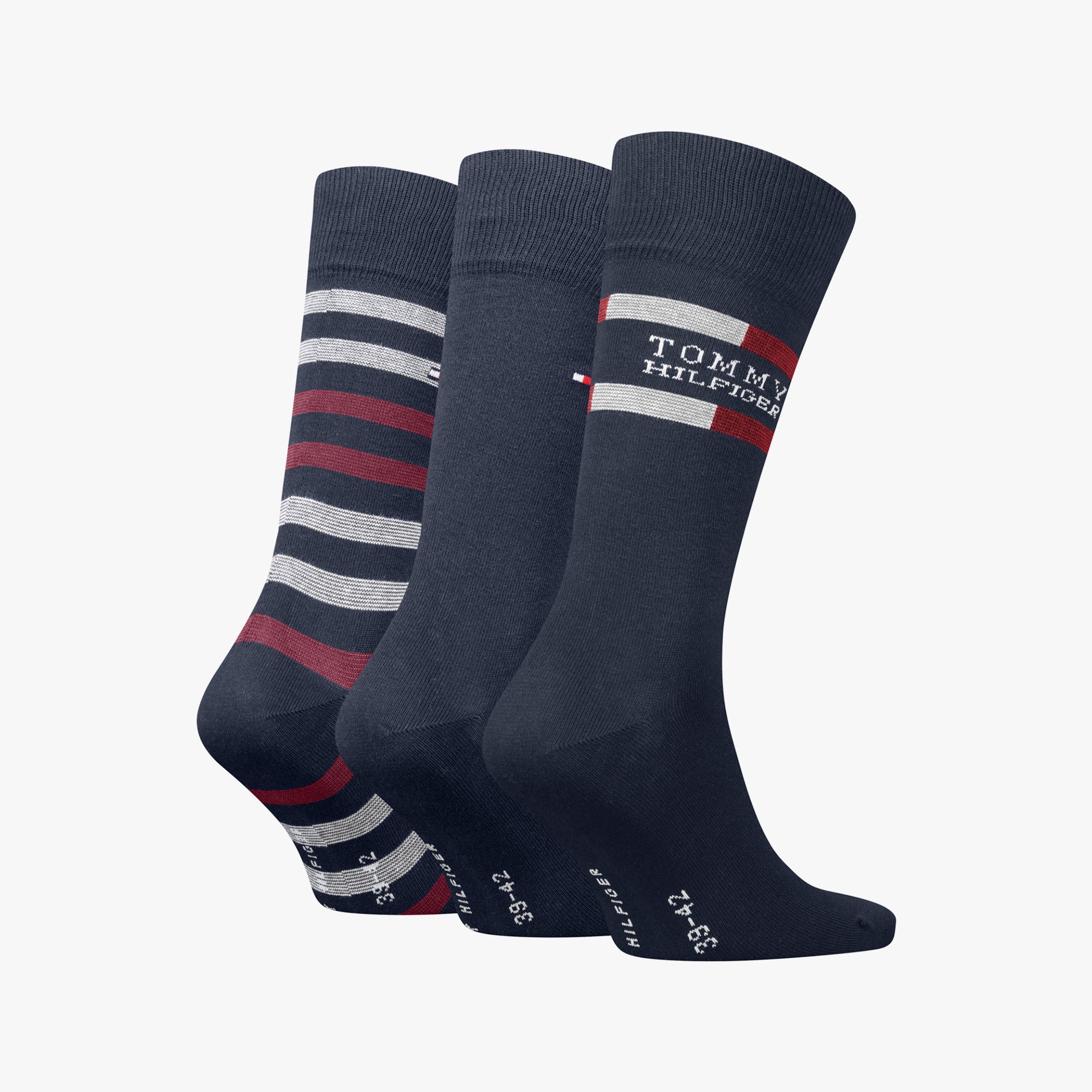 Tommy Hilfiger 3 Pack Giftbox Tommy Stripe Mens Socks Navy, side view showing striped and solid designs in navy.