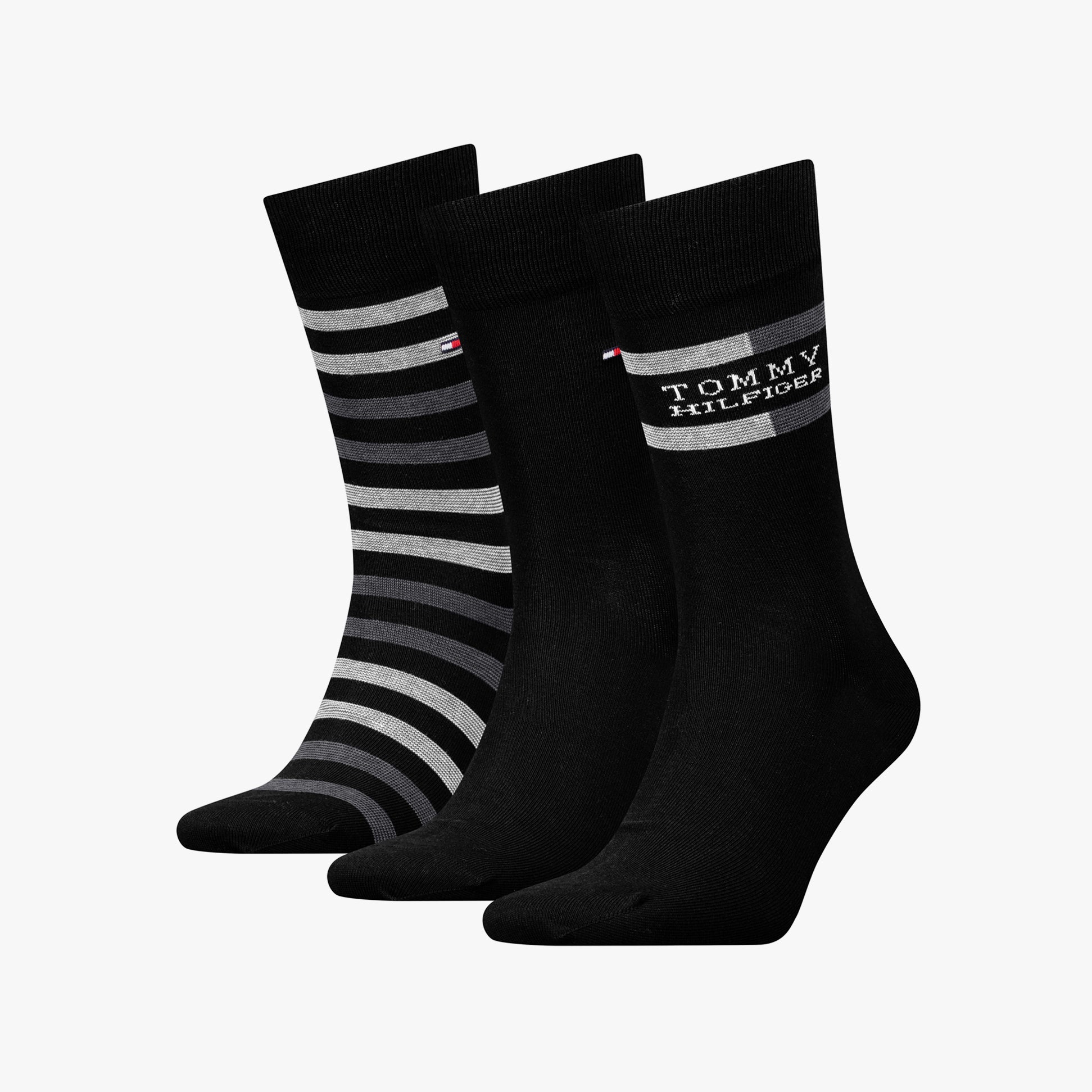 Tommy Hilfiger 3 Pack Giftbox Tommy Stripe Mens Socks Black, crew socks displayed front view, featuring striped and plain black designs.