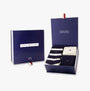 Tommy Hilfiger 3 Pack Giftbox Bootsock Mens Socks Navy displayed in a gift box, showcasing multiple pairs with color and pattern variations.