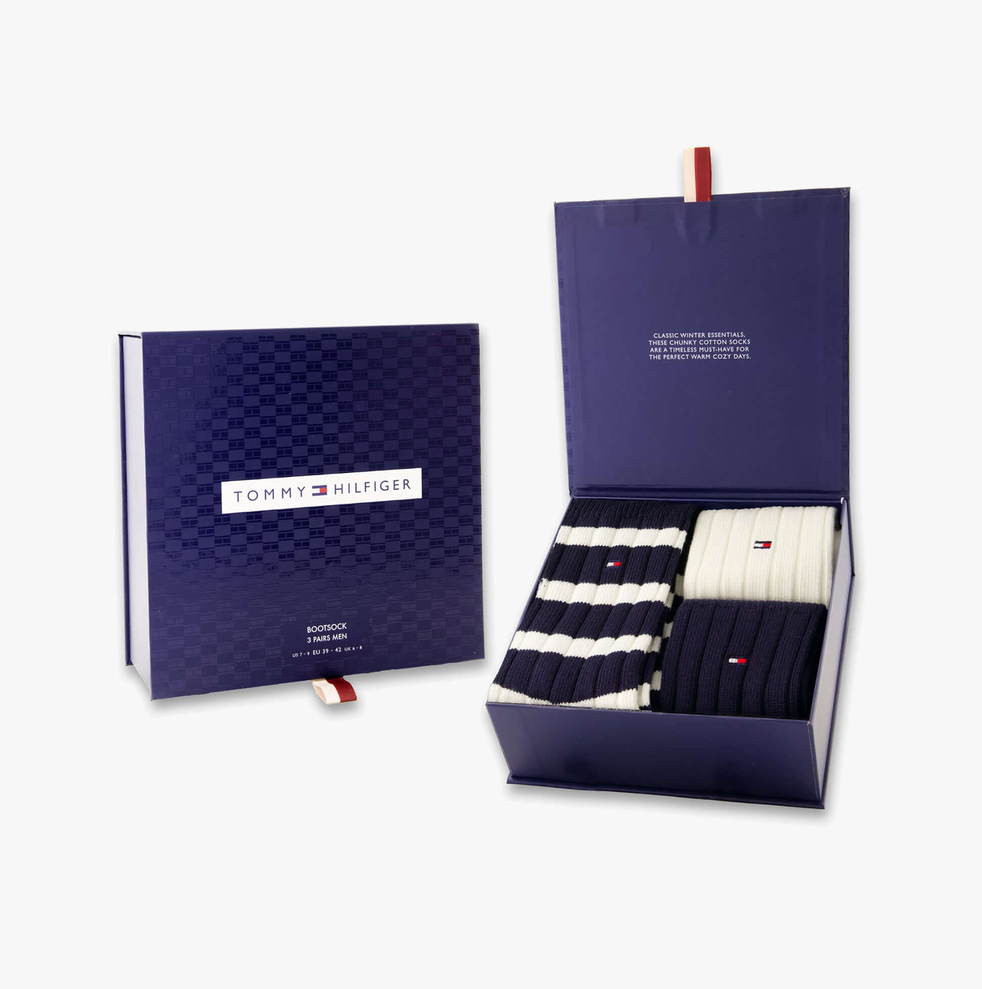 Tommy Hilfiger 3 Pack Giftbox Bootsock Mens Socks Navy displayed in a gift box, showcasing multiple pairs with color and pattern variations.