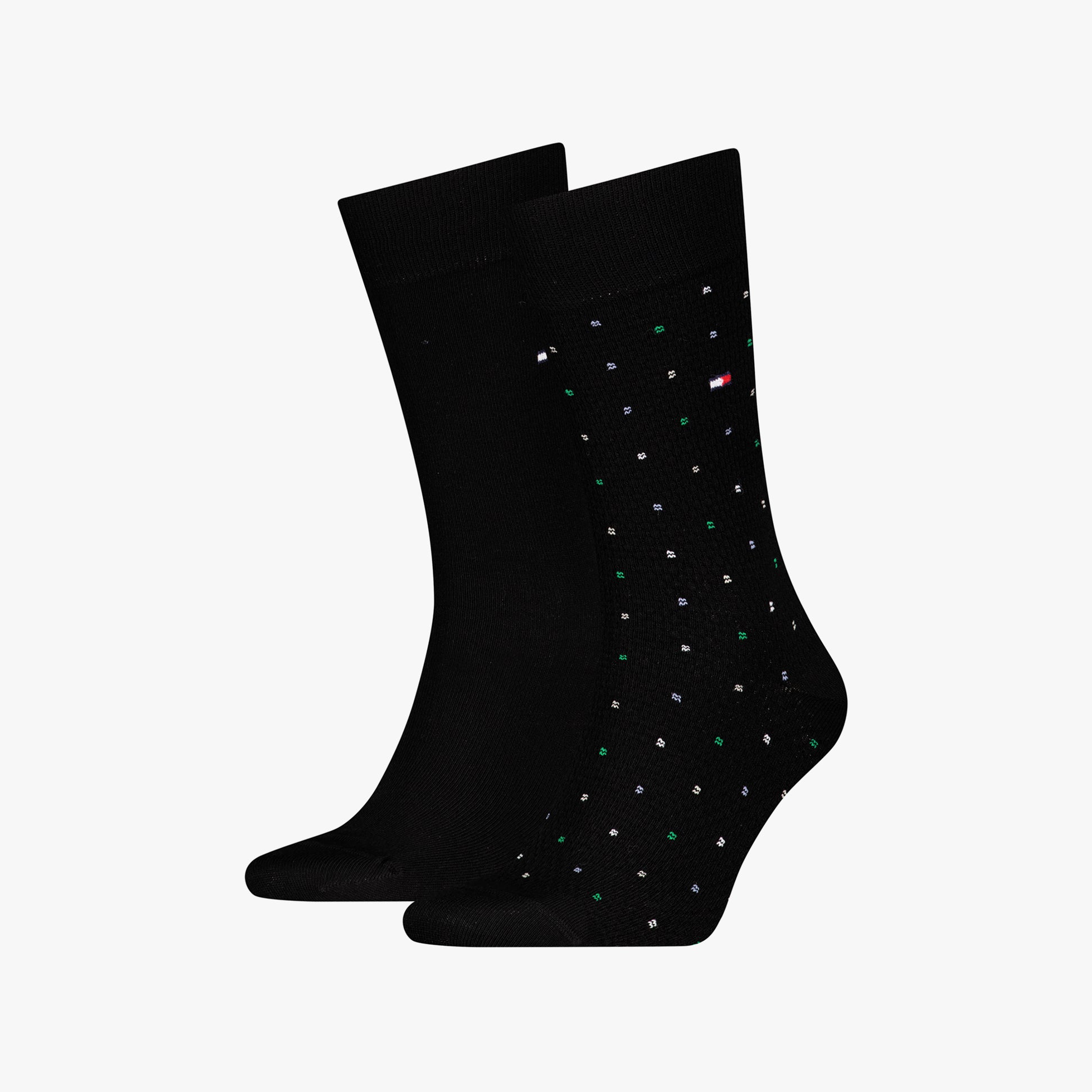 Tommy Hilfiger 2 Pack Structure Dot Mens Socks Black side view, featuring one solid black sock and one black dotted sock.