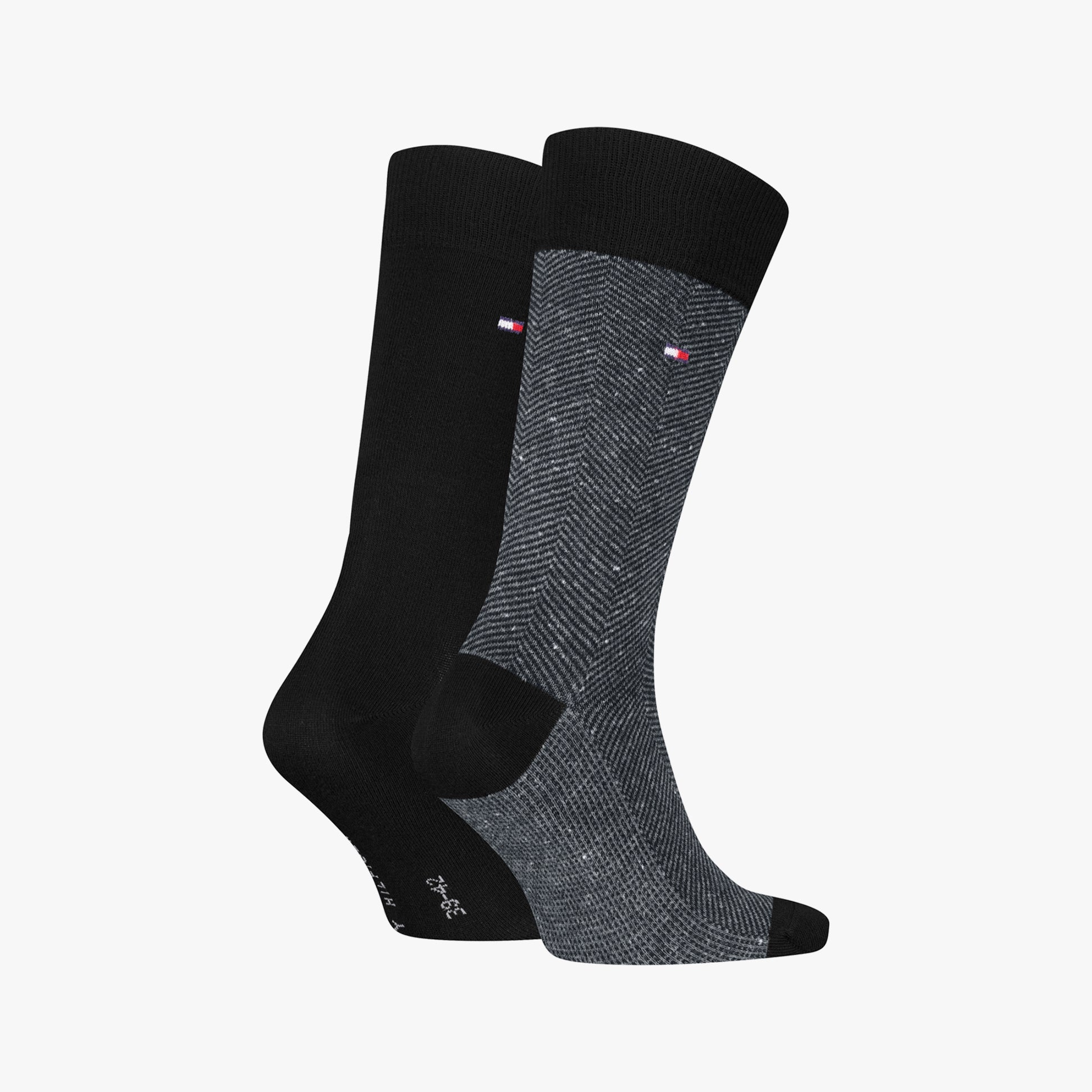 Tommy Hilfiger 2 Pack Nappy Herringbone Mens Socks Black side view showcasing black and herringbone patterns.