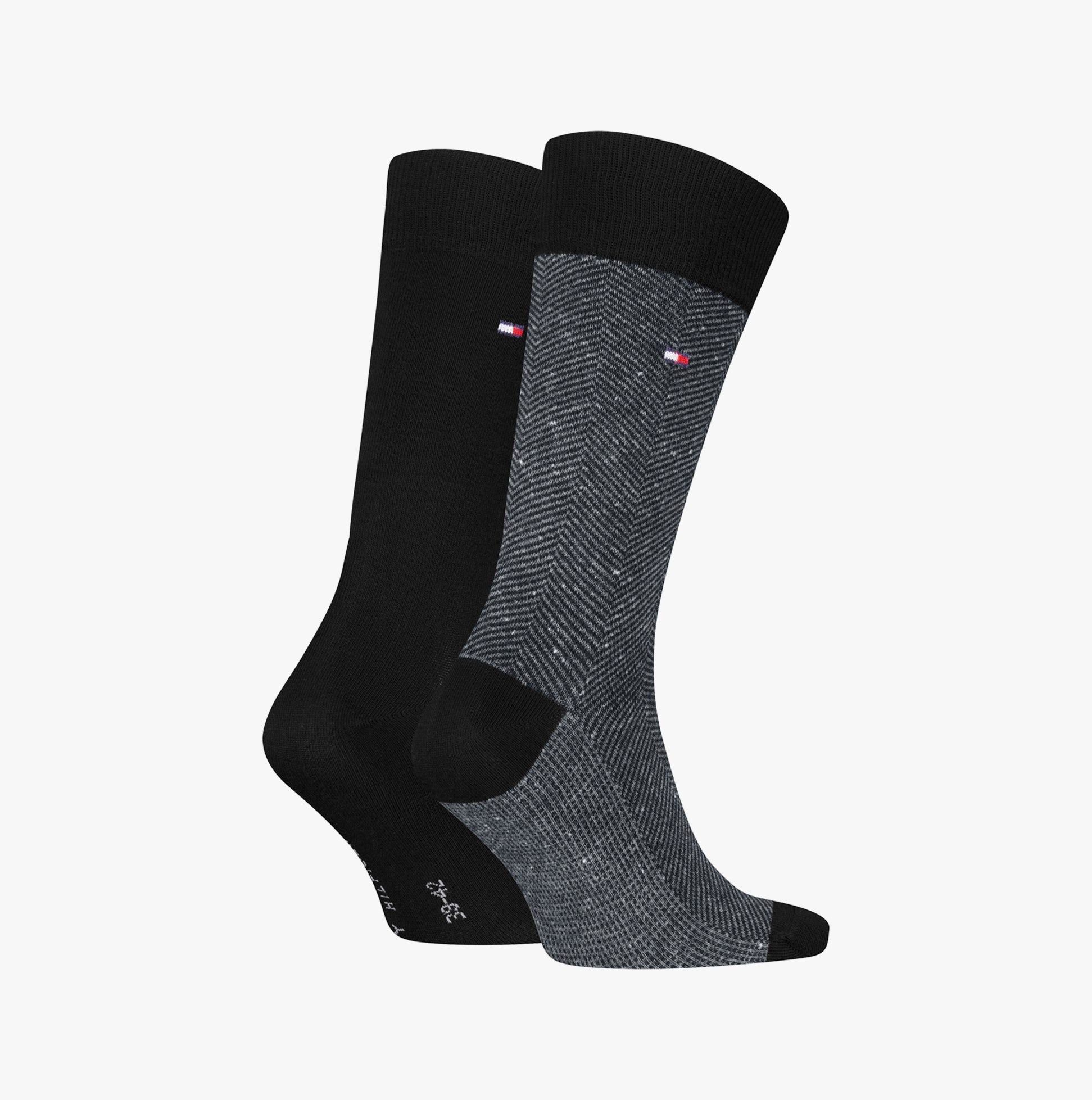 Tommy Hilfiger 2 Pack Nappy Herringbone Mens Socks Black side view showcasing black and herringbone patterns.