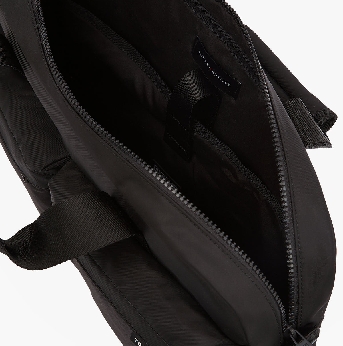 Tommy Hilfiger Rubberised Logo Laptop Bag detail view showing interior compartments and zip closure.