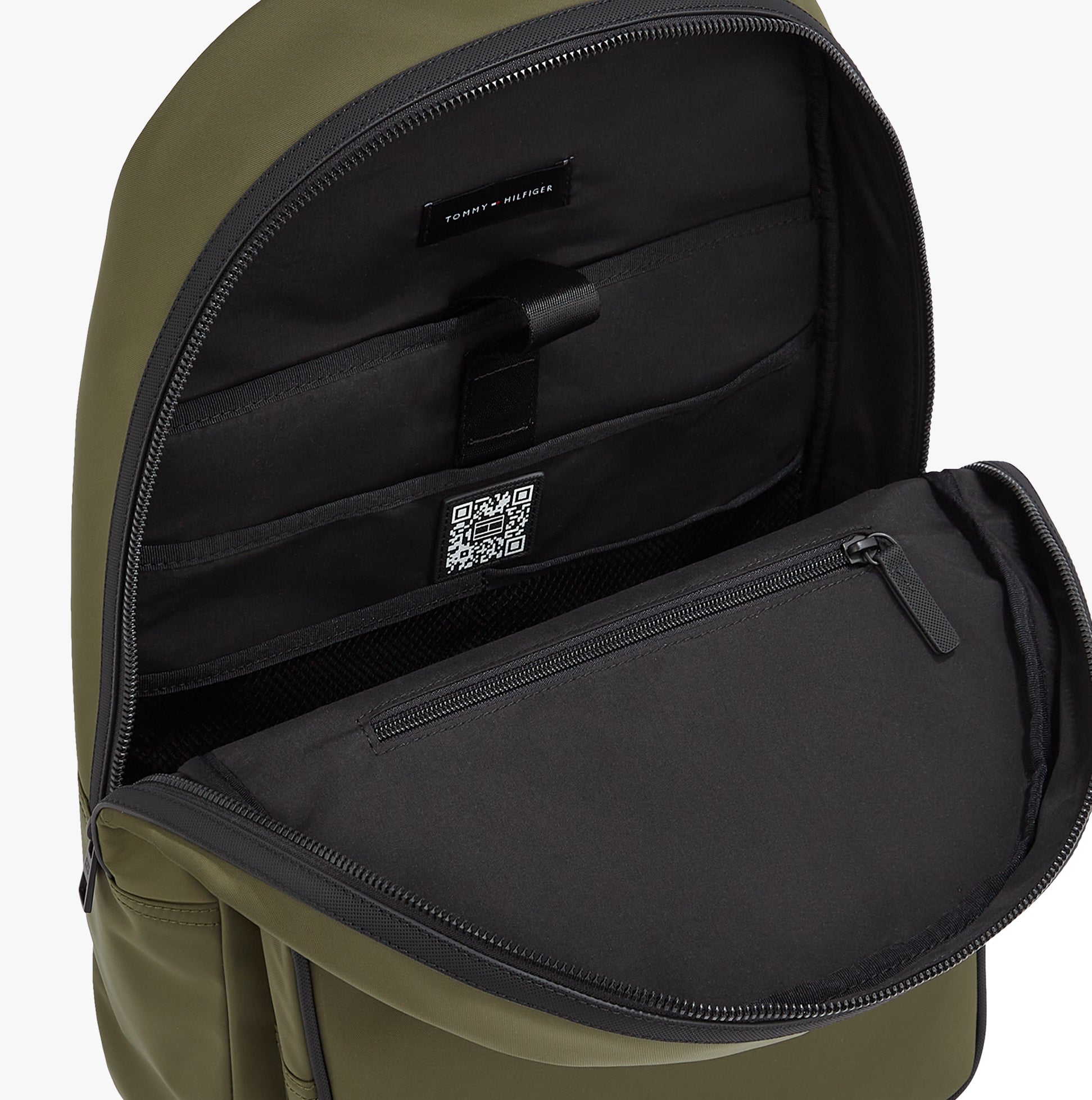 Tommy Hilfiger REPREVE Metal Logo Backpack Army Green interior view showing laptop sleeve and zipped pocket.