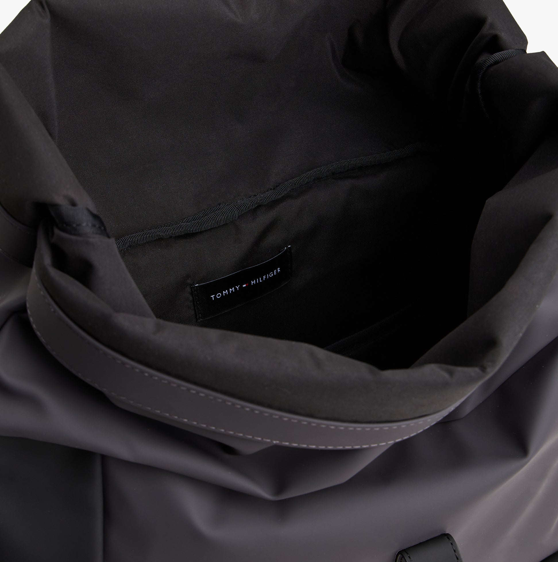 Tommy Hilfiger Mens Roll Top Backpack Charcoal Gray interior view, showcasing the top opening and lining details.