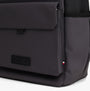 Tommy Hilfiger Mens Roll Top Backpack Charcoal Gray side view with buckle closure and detail on pocket.