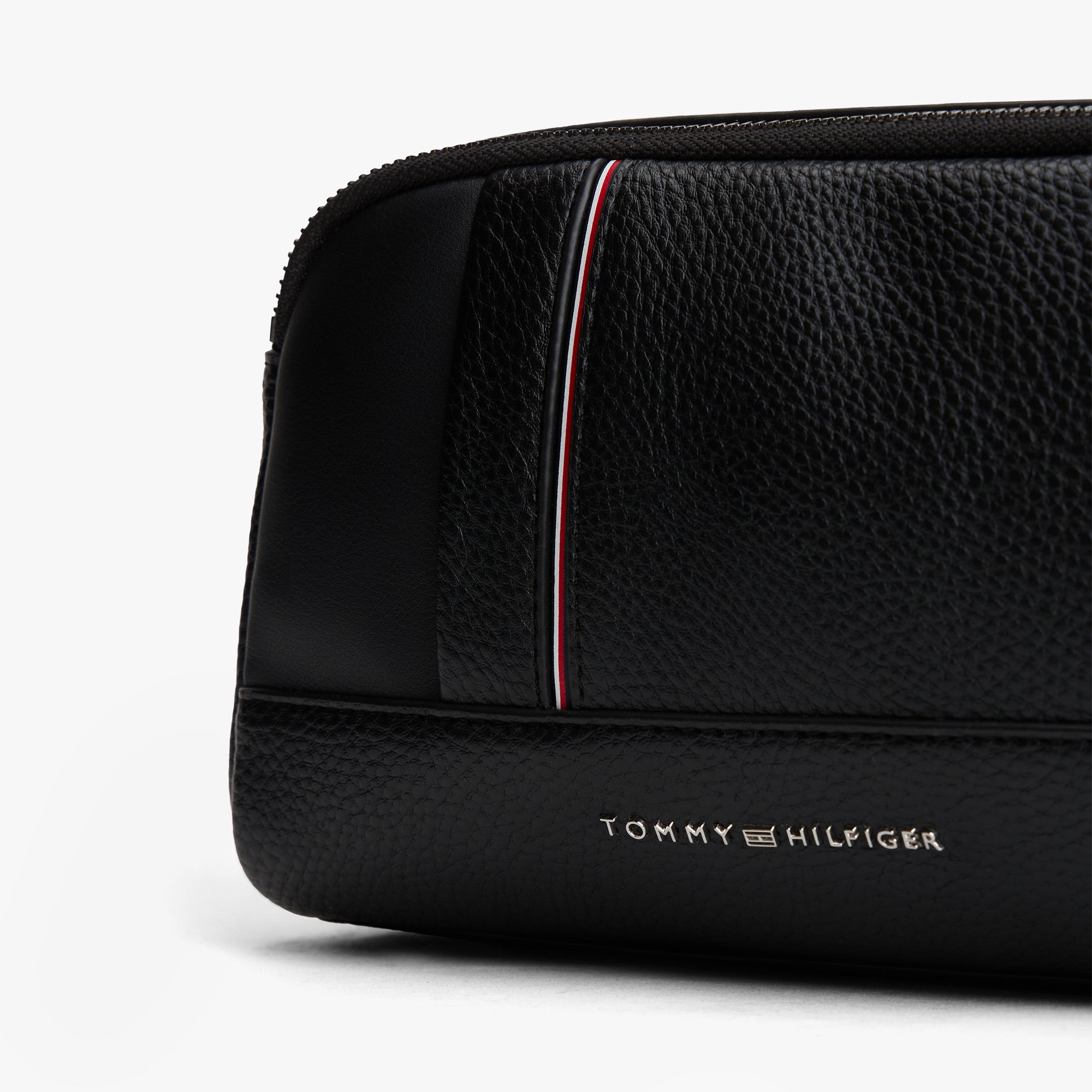 Tommy Hilfiger CENTRAL WASHBAG Mens Washbag Black detail view showing logo and texture.