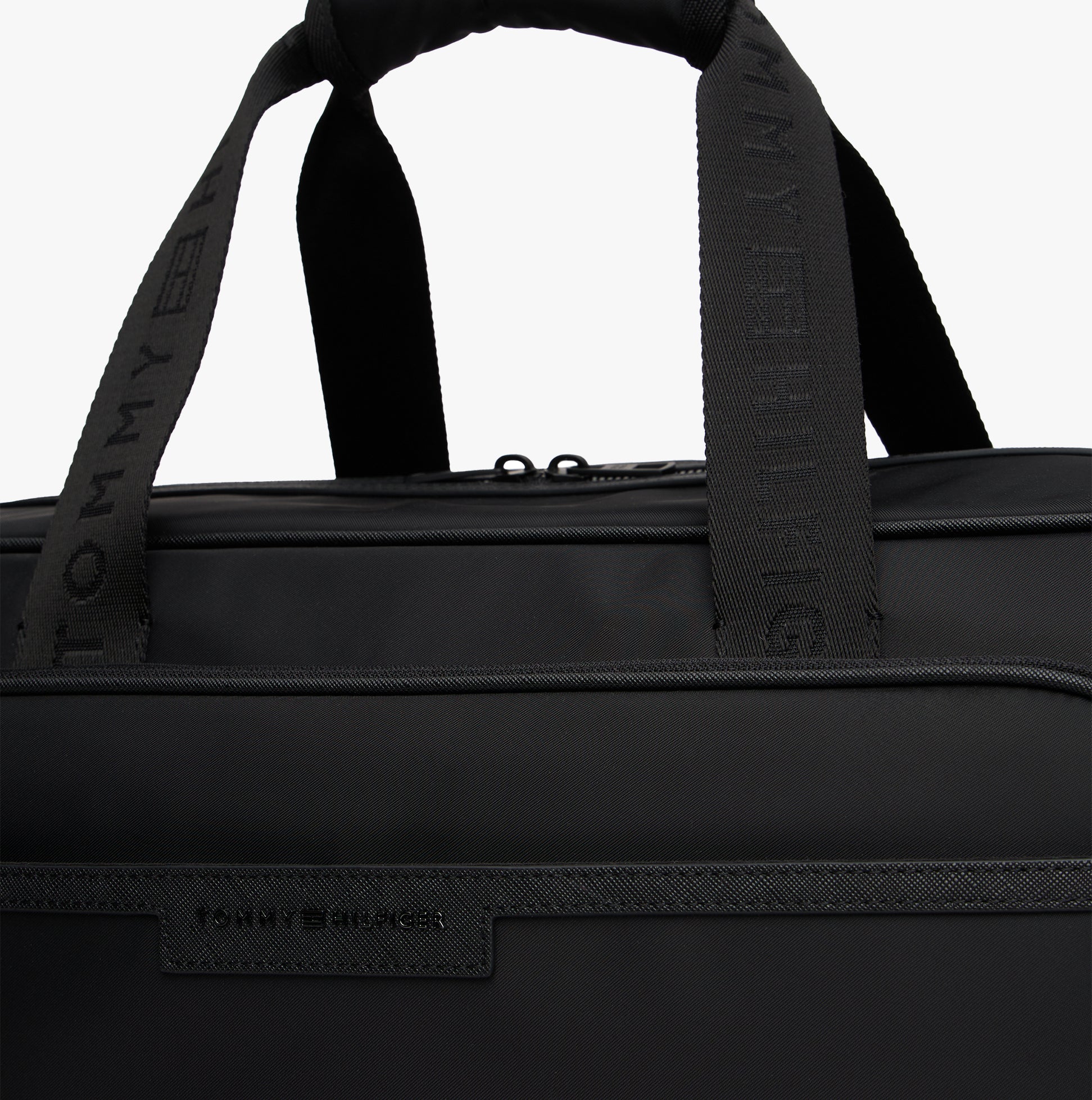 Tommy Hilfiger REPREVE DUFFLE Mens Duffle Bag Black detail view showcasing top handles and zipper.