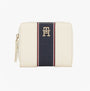 Tommy Hilfiger Womens monogram wallet with TH signature Cream front view showing zip closure and signature design.