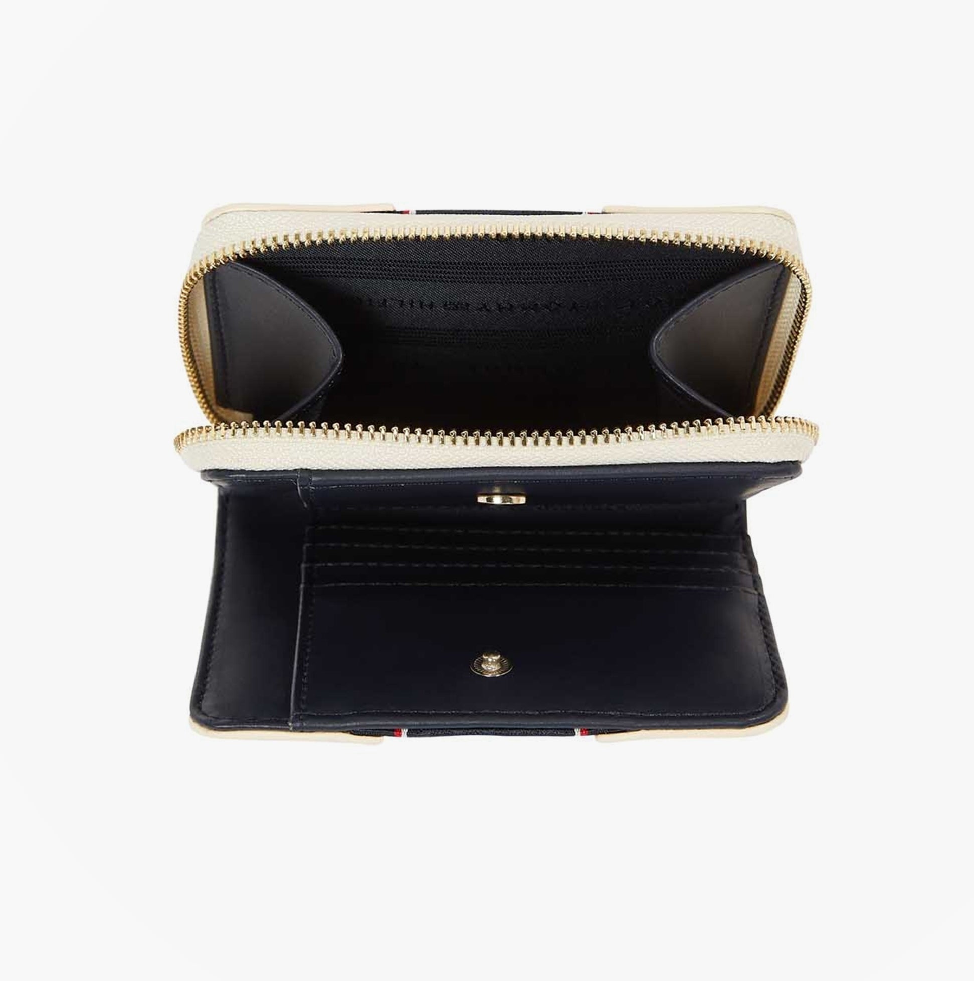 Tommy Hilfiger Womens monogram wallet with TH signature Cream inside view showing compartments and zip fastener.