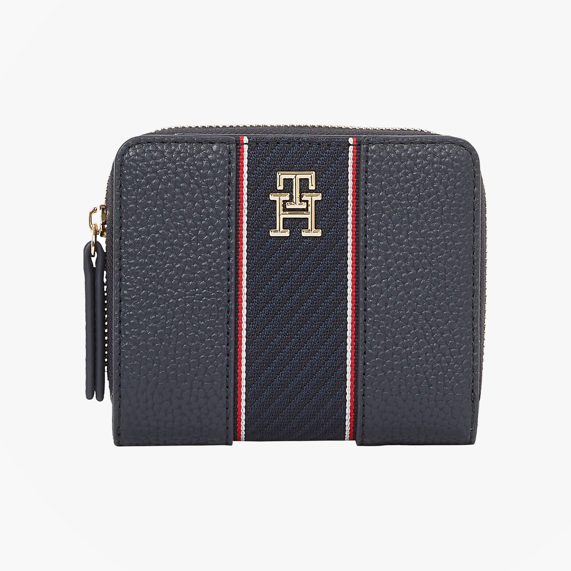 Tommy Hilfiger Womens monogram wallet with TH signature front view in navy with gold logo and stripe details.