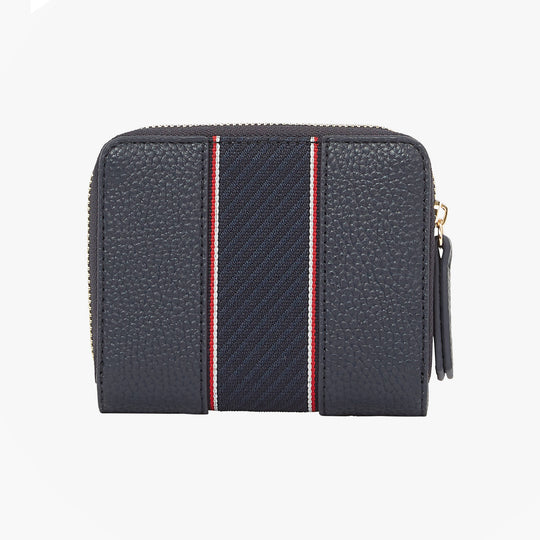 Tommy Hilfiger Womens monogram wallet with TH signature front view in navy with stripe details.