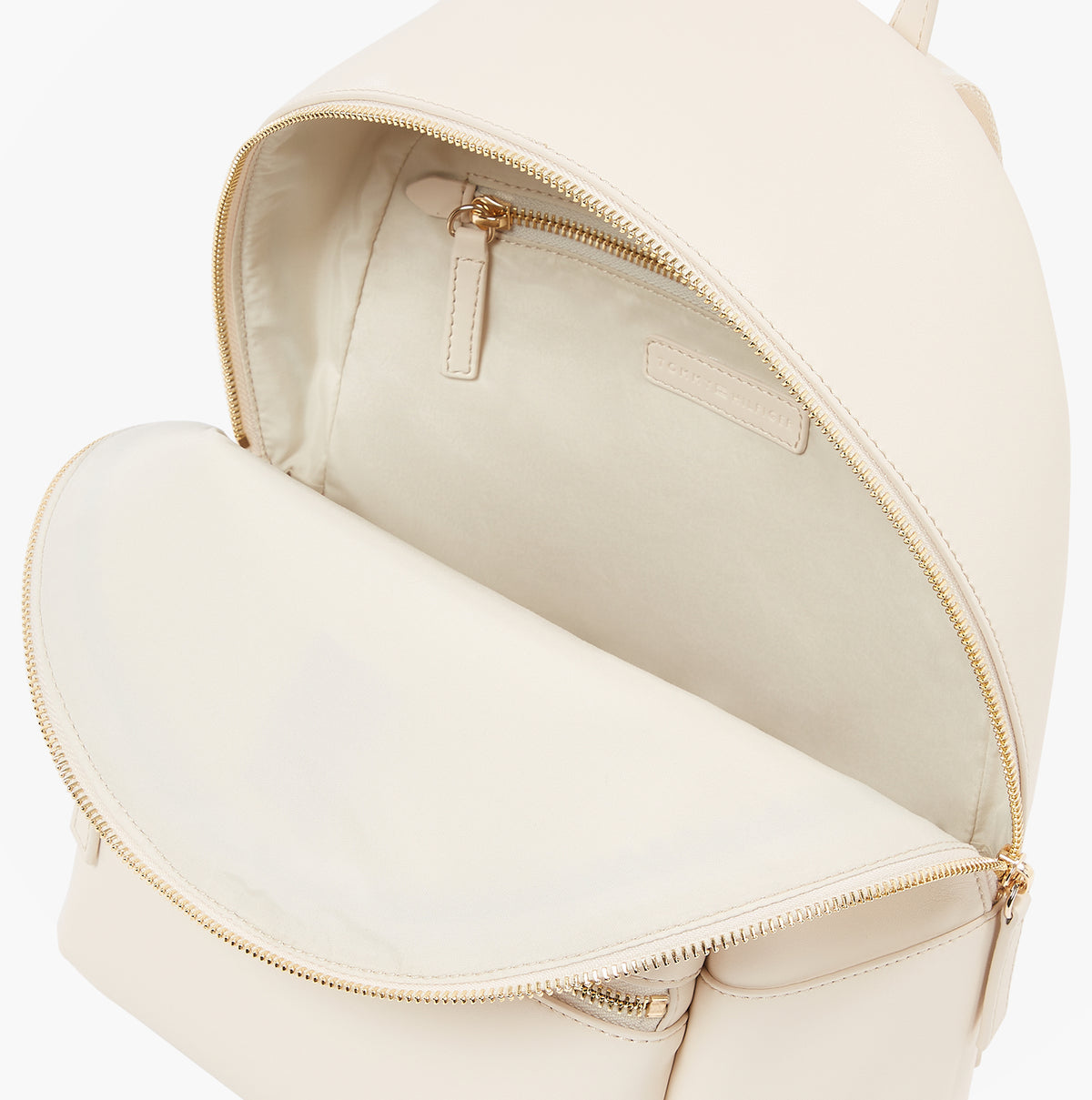 Tommy Hilfiger LOGOTAPE Womens Backpack Sugarcane interior detail view showcasing zip pocket and smooth lining