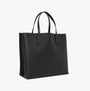 Tommy Hilfiger DISTINCT SATCHEL Womens Handbag Black side view showcasing embossed design and sturdy handles.