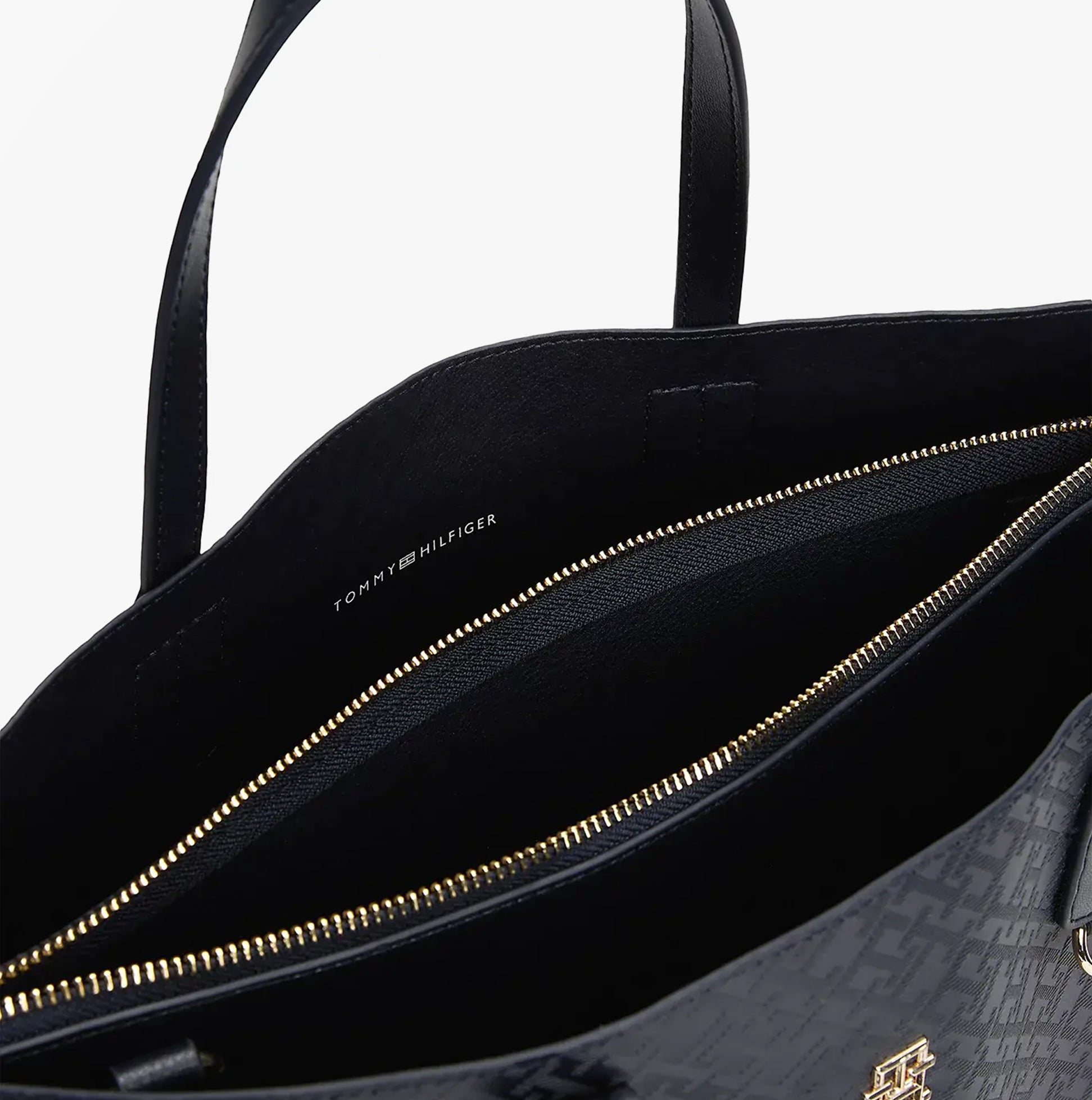 Tommy Hilfiger DISTINCT SATCHEL Ladies Handbag Space Blue interior view showing zip compartments and logo