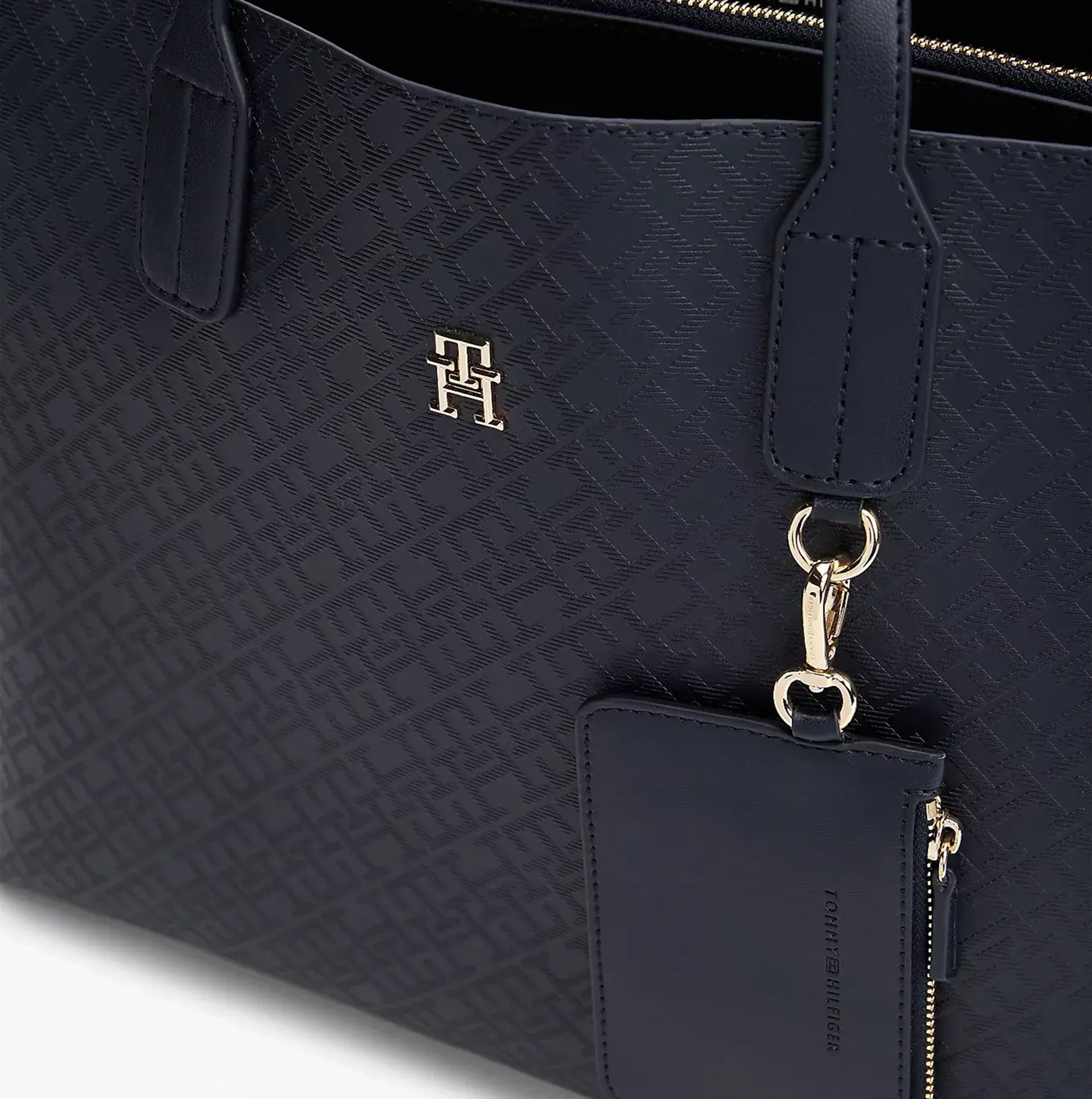 Tommy Hilfiger DISTINCT SATCHEL Ladies Handbag Space Blue close-up view showing embossed design and detachable coin purse.