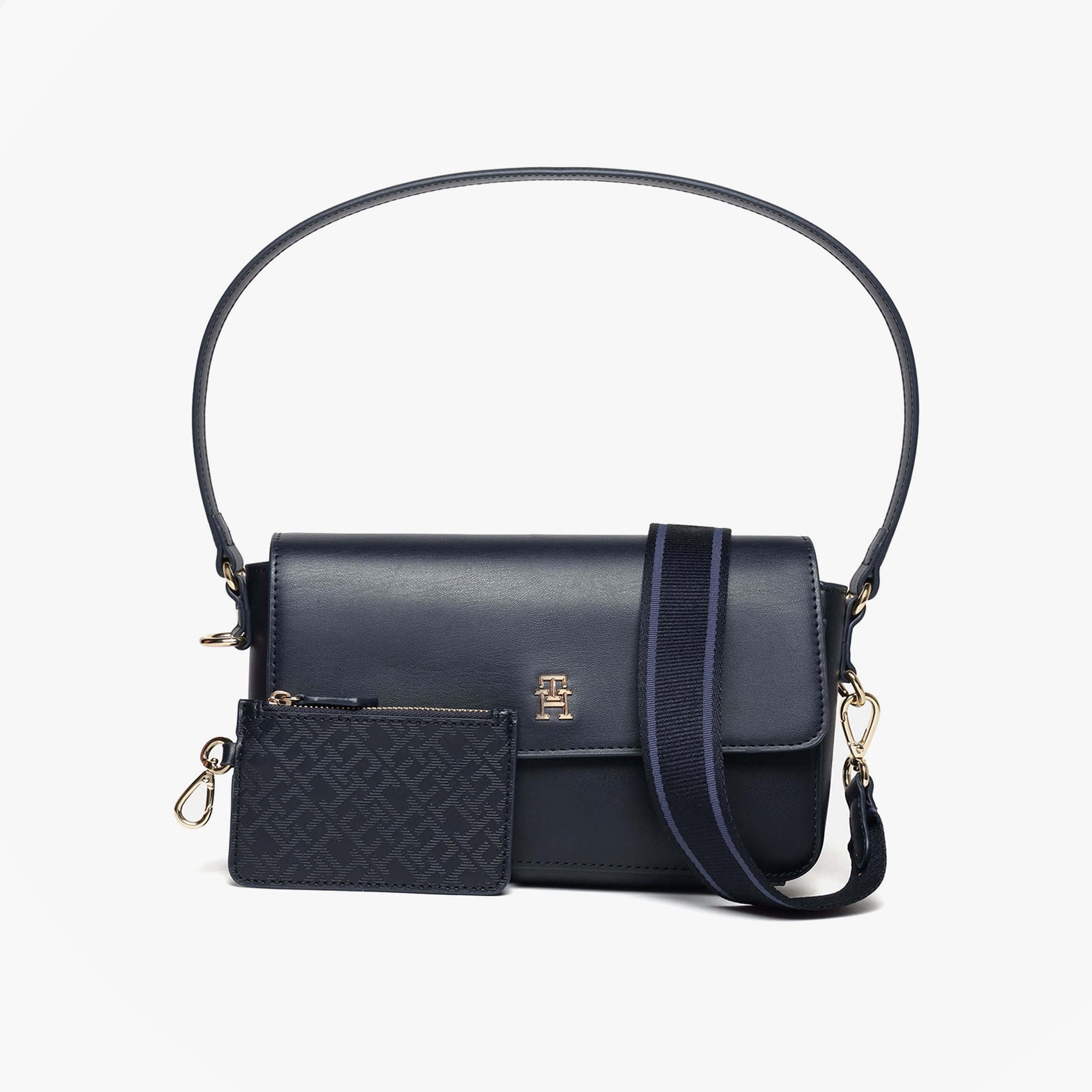 Tommy Hilfiger CONVERTIBLE Womens Crossbody Bag Space Blue front view with detachable cardholder and adjustable strap.