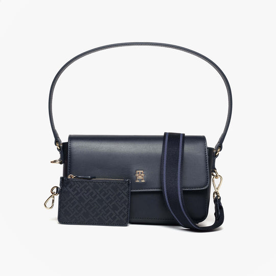 Tommy Hilfiger CONVERTIBLE Womens Crossbody Bag Space Blue front view with detachable cardholder and adjustable strap.