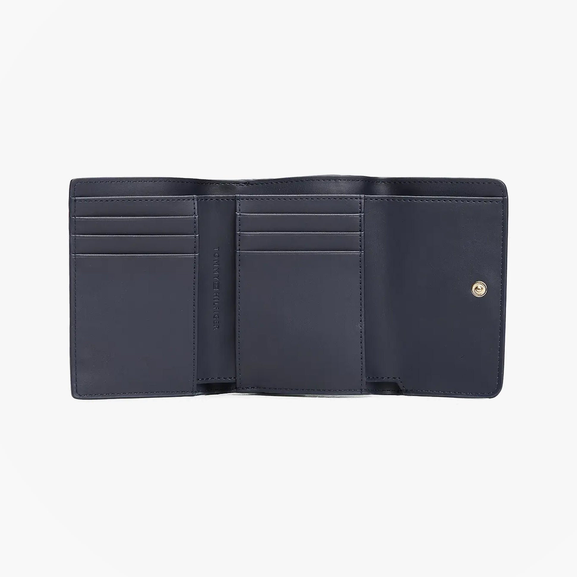 Tommy Hilfiger Womens Monogram Trifold Wallet Navy interior view featuring card slots and button closure.
