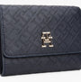Tommy Hilfiger Womens Monogram Trifold Wallet Navy front view with textured pattern and gold logo detail.
