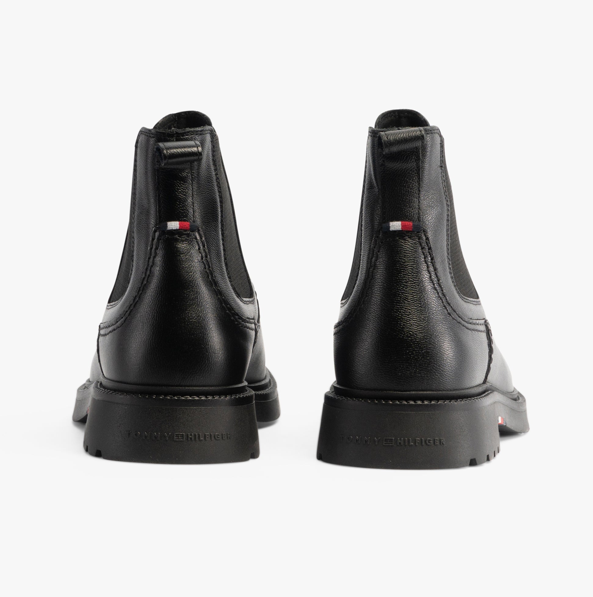 Tommy Hilfiger HILFIGER COMFORT Mens Chelsea Boots Black back view, showcasing sleek leather, elasticated side panels, and block heel.
