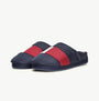 Tommy Hilfiger NYLON FLAG Mens Loafers Desert Sky side view showing comfortable slip-on design in blue and red.