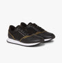 Tommy Hilfiger LEATHER SERRATED RUNNER Mens Trainers Black side view showcasing sleek design and color contrast.
