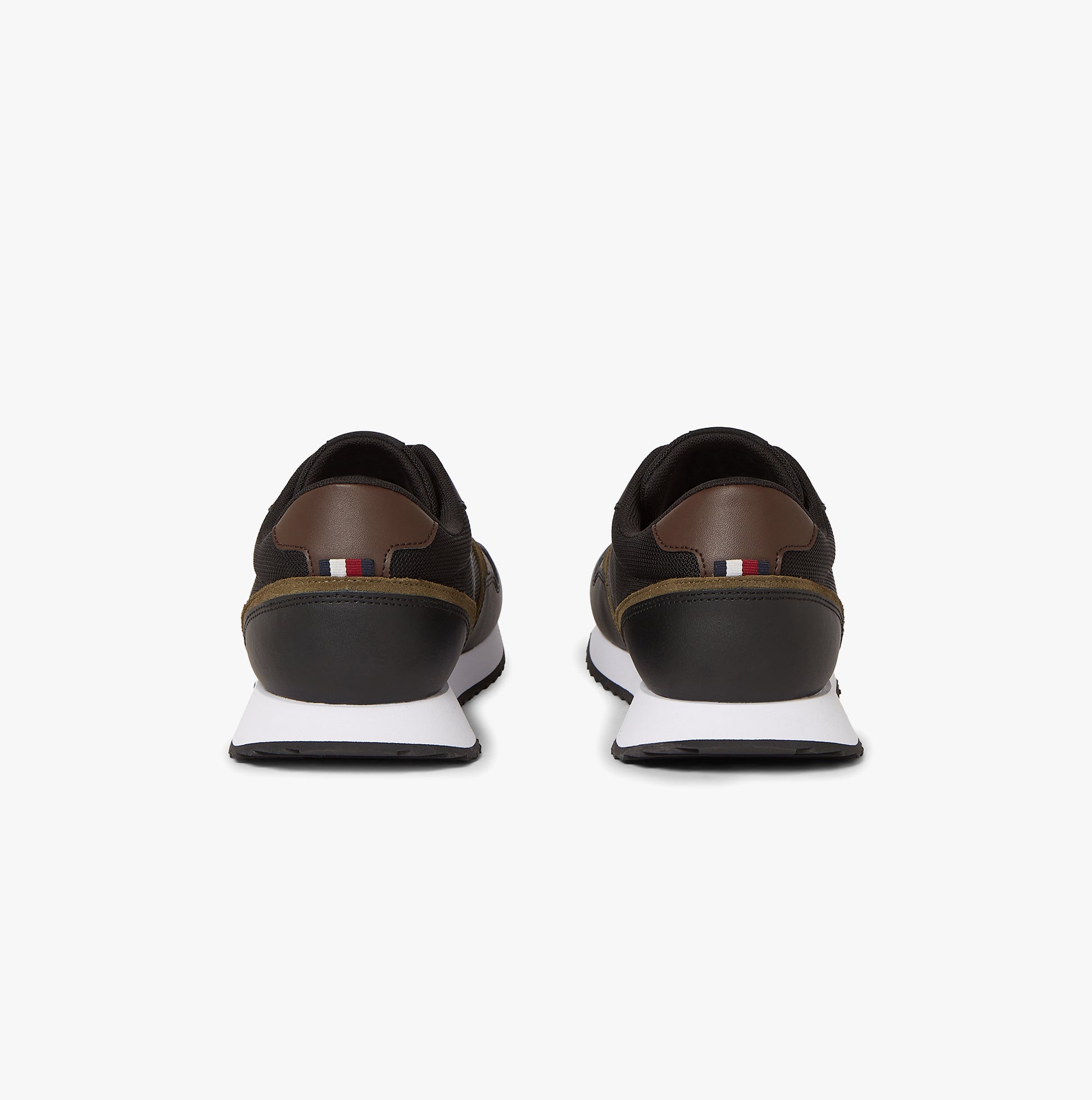 Tommy Hilfiger LEATHER SERRATED RUNNER Mens Trainers Black rear view showcasing stylish design and detailing.