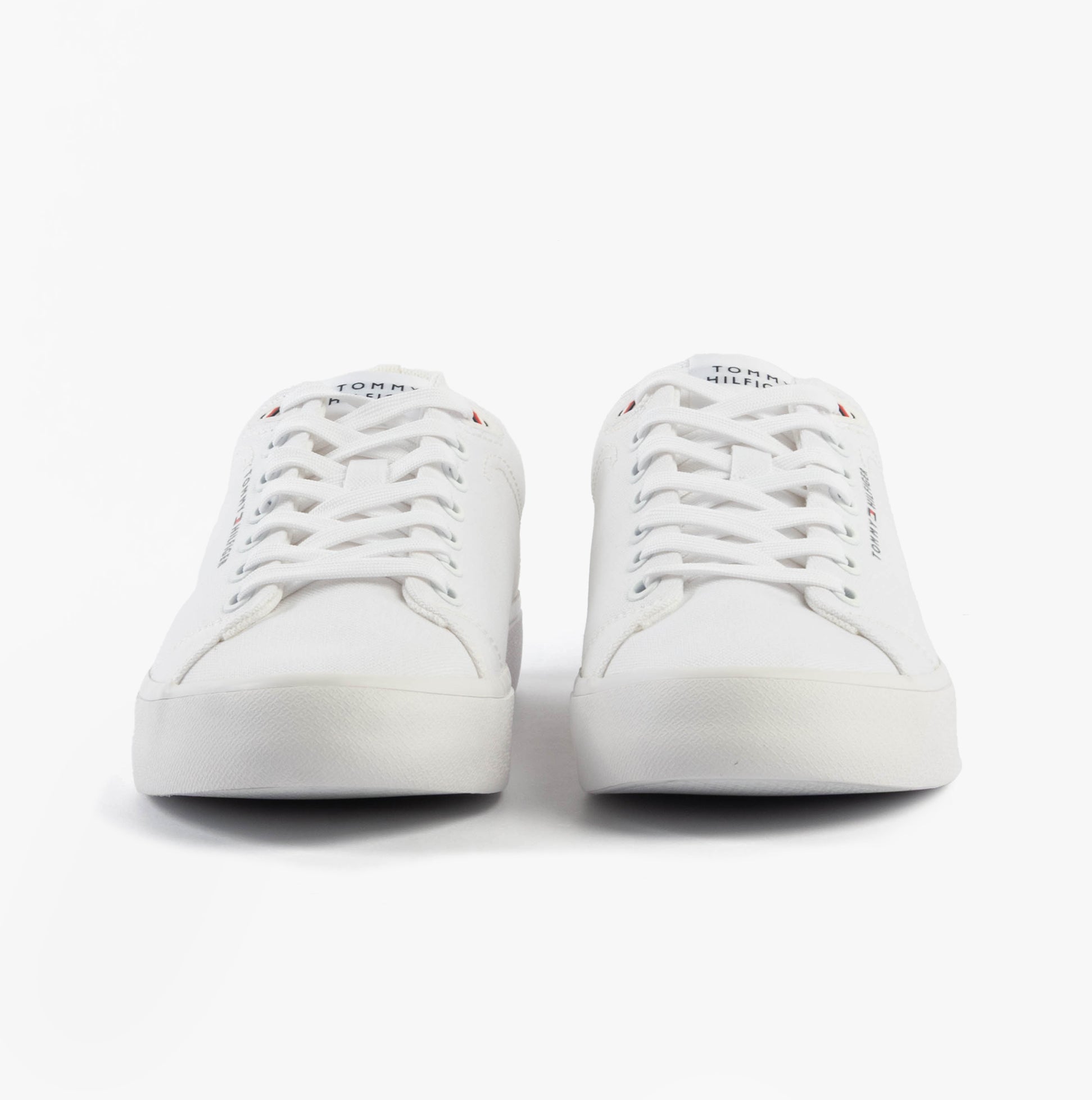 Tommy Hilfiger LOGO PATCH Mens Trainers White front view showing lace-up design and casual style.