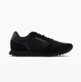Tommy Hilfiger ESSENTIAL MIXED TEXTURE Mens Trainers Black side view showcasing the casual design and black upper.