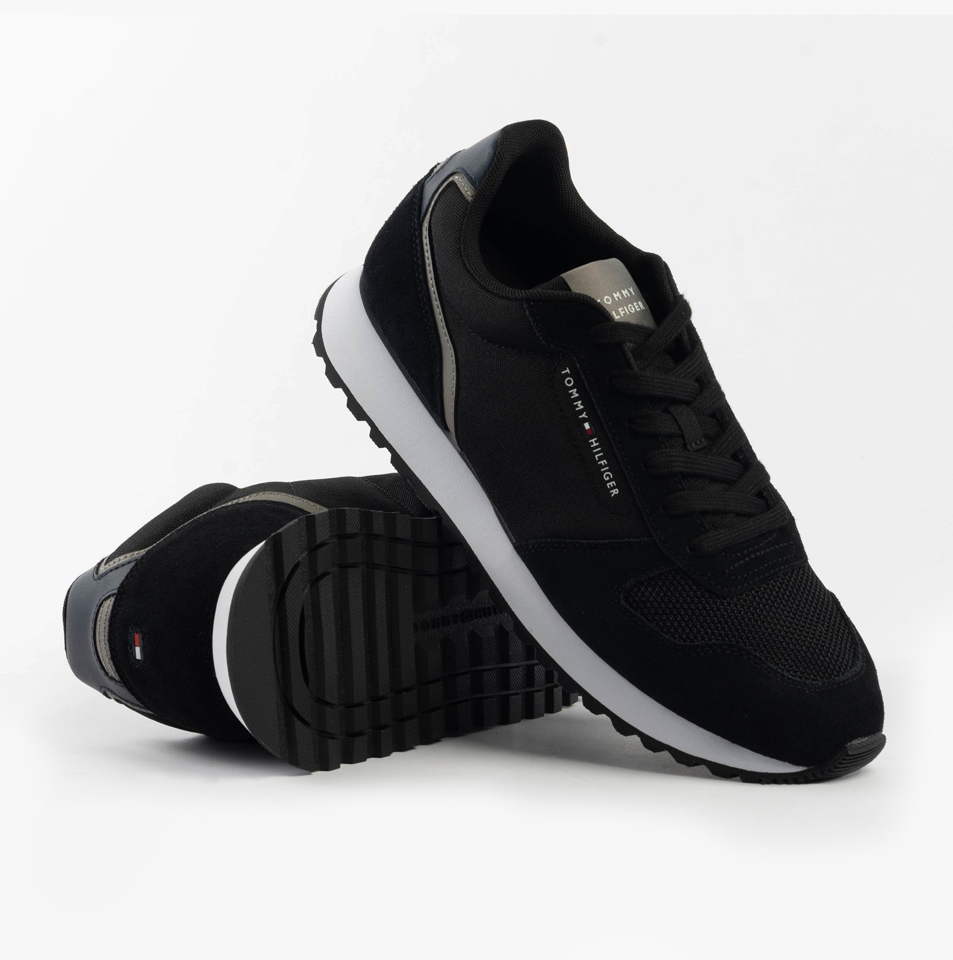 Tommy Hilfiger SUEDE LOGO Mens Trainers Black, side view, showcasing suede upper and comfortable lace-up design.