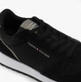 Tommy Hilfiger SUEDE LOGO Mens Trainers Black close-up view showing laces and logo details on black suede.