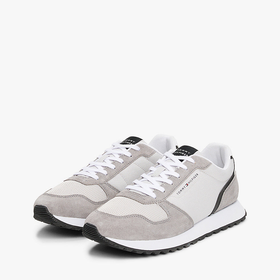 Tommy Hilfiger NEW RUNNER EVA MIX Mens Trainers Grey Whisper side view, featuring suede upper, lace-up closure and rubber sole.