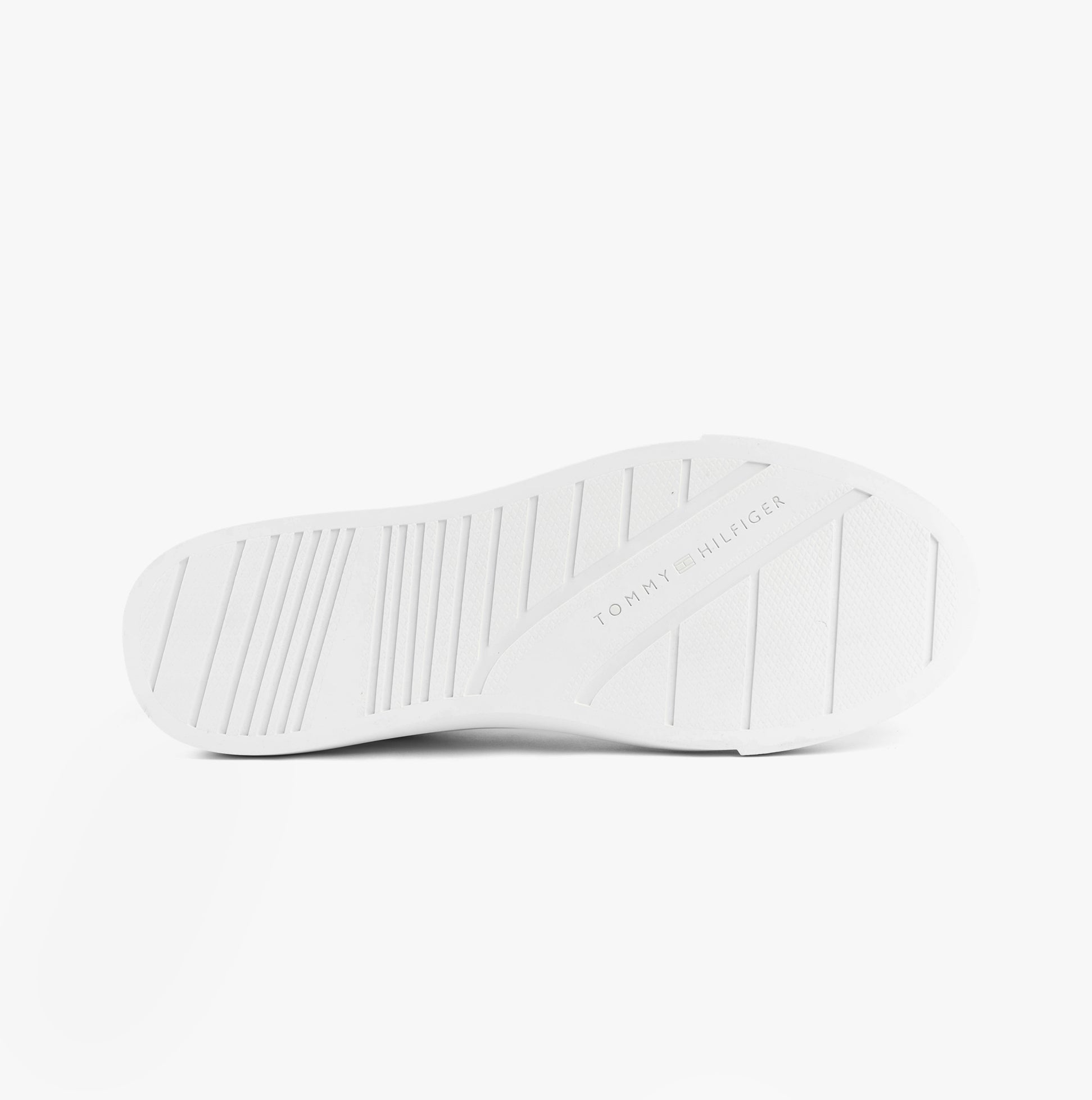 Tommy Hilfiger SUEDE CONTRAST CUPSOLE Mens Trainers White bottom view showing rubber sole design.