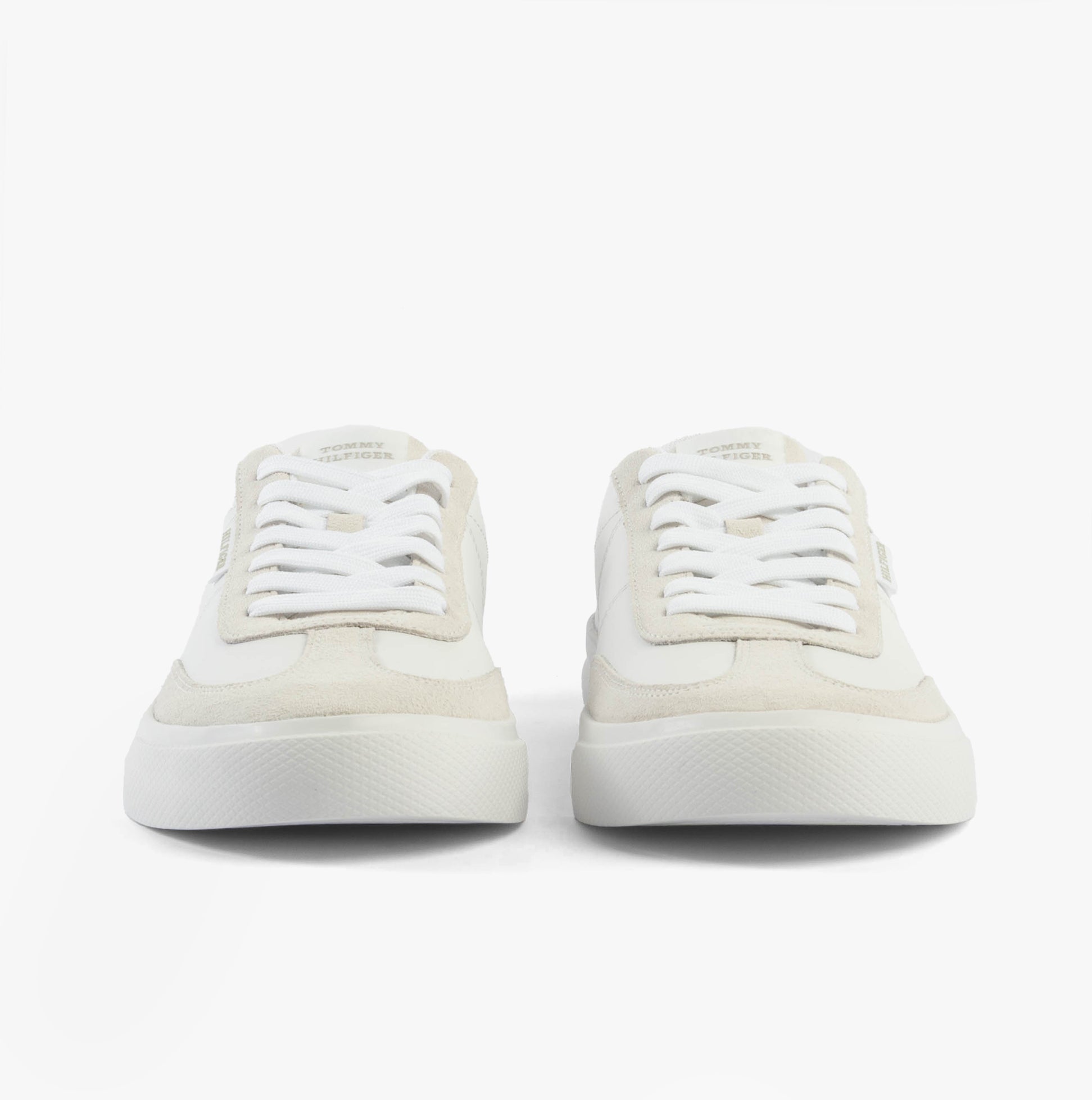Tommy Hilfiger SUEDE CONTRAST CUPSOLE Mens Trainers White front view, showcasing lace-up design and suede details.