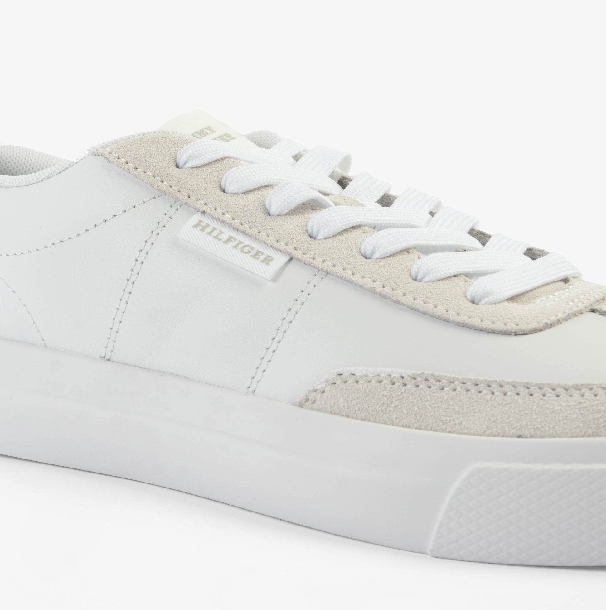 Tommy Hilfiger SUEDE CONTRAST CUPSOLE Mens Trainers White side view with suede and rubber details.