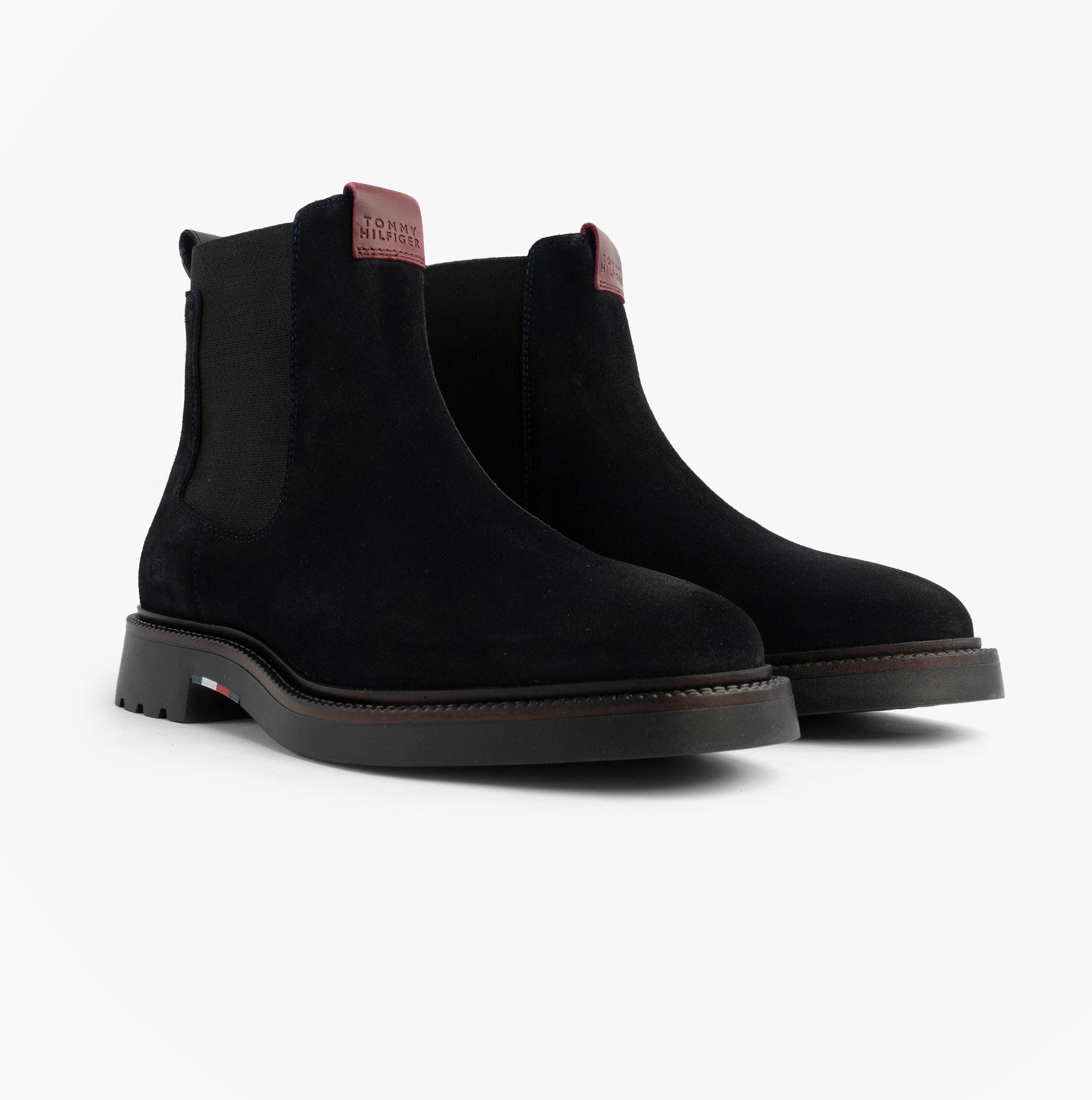 Tommy Hilfiger HILFIGER COMFORT Mens Suede Chelsea Boots Desert Sky side view showing black suede material and pull-on style.