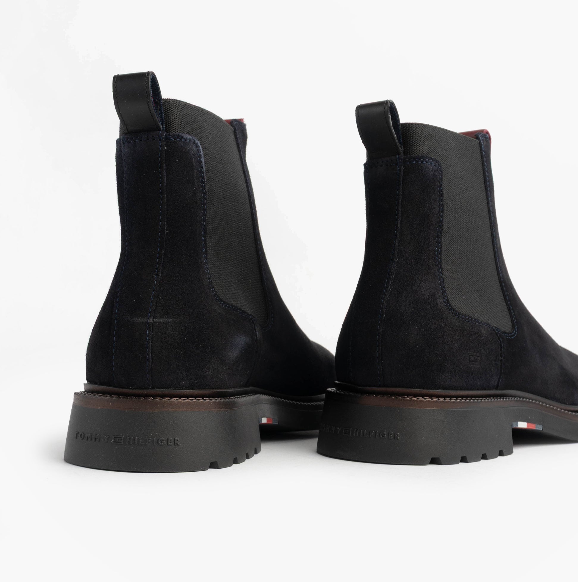 Tommy Hilfiger HILFIGER COMFORT Mens Suede Chelsea Boots Desert Sky rear view showcasing suede upper and rubber sole.