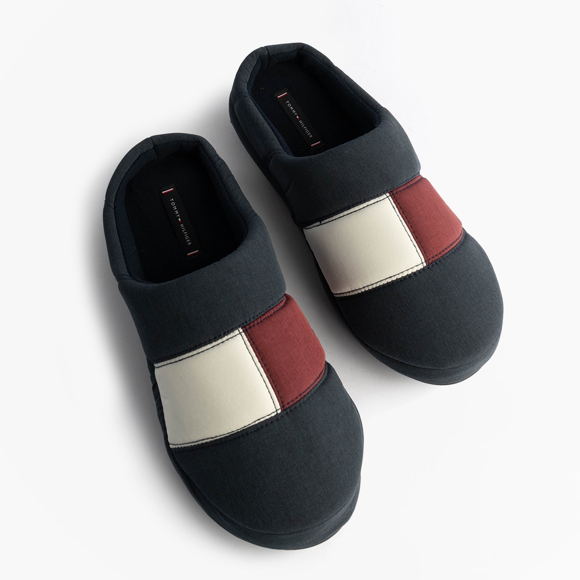 Tommy Hilfiger HILFIGER FLAG HOUSE Mens House Slippers Desert Sky top view with color block design in red, white, and navy.