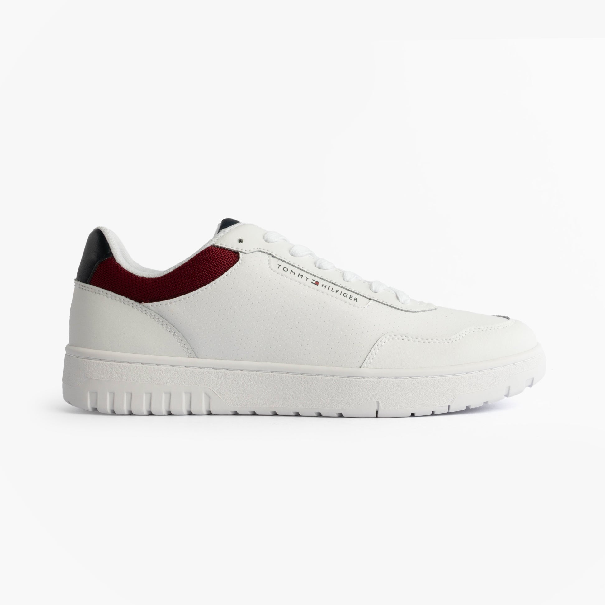 Tommy Hilfiger TH BASKET CORE LTH Mens Court Trainers Trainers Rwb side view showcasing white leather and red accents.