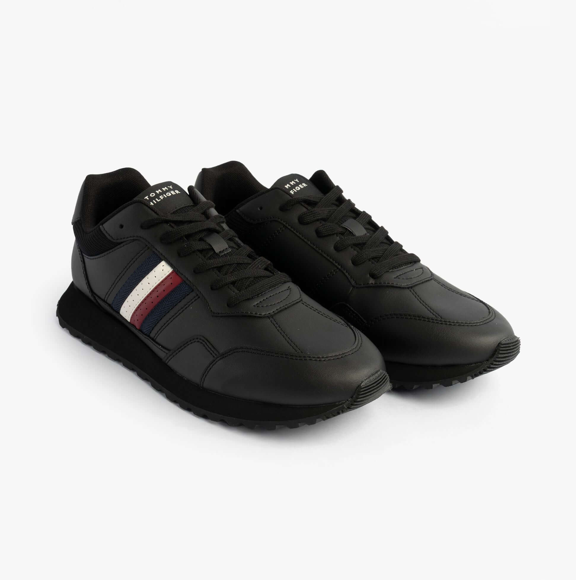 Tommy Hilfiger Mens Signature Tape Cleat Leather Trainers Black side view showing leather upper and lace-up closure
