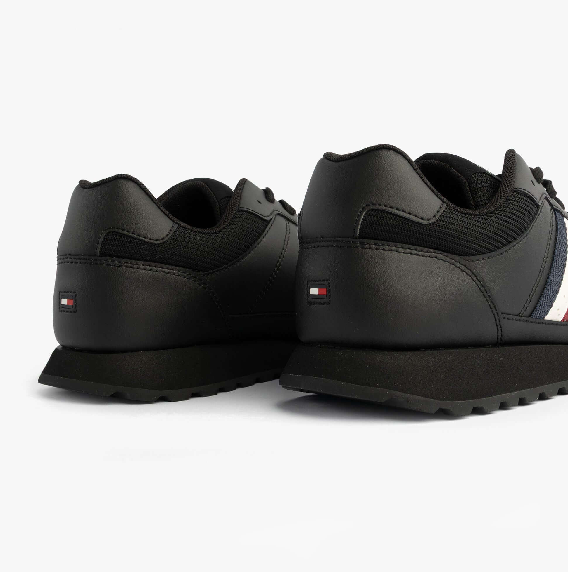 Tommy Hilfiger Mens Signature Tape Cleat Leather Trainers Black back view showcasing sleek design and logo detail.